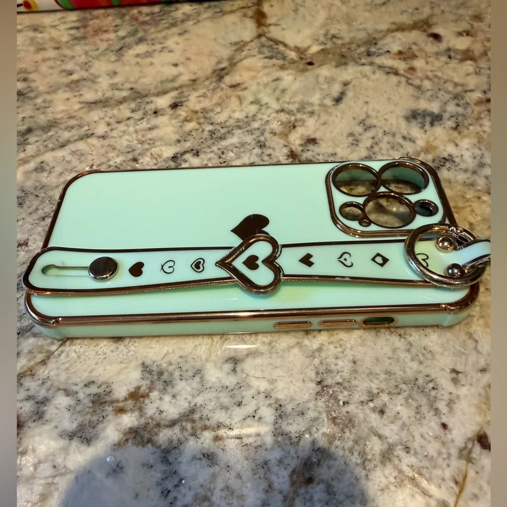 iPhone 13 Pro Mint Green & Gold Heart Phone Case with stand and ring attachments